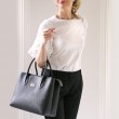 Grained leather Tote, black color on model