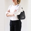 Crossbody bag "NEW FRENCHY" in grained leather, black color, on shoulder