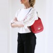 Crossbody bag NEW FRENCHY in smooth leather, red color - on shoulder