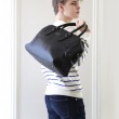 48h handbag for men in grained calf leather black color - on model
