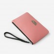 SUZY, grained leather zipper pouch in pink marshmallows color with black wrist strap - side view