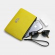 SUZY, grained leather zipper pouch, lemon yellow color with black wrist strap - with mobile phone and sunglasses