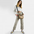 Crossbody bag "NEW FRENCHY" in grained leather, beige color, on a young model