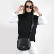 Crossbody bag "NEW FRENCHY" in grained leather, black color, on a model