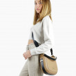 Crossbody bag "NEW FRENCHY" in grained leather, beige color, on a model