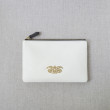 JULIE, zipper pouch in grained calfskin, off-white color - front view on linen