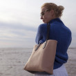 "ANNIE'S" grained leather Tote, nude color - on model, shoulder view