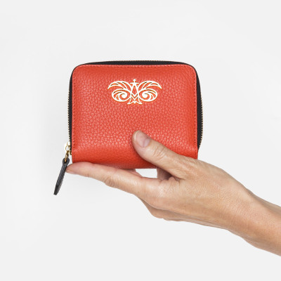 Compact zippered wallet in grained calf leather "MANON", Red Hibiscus color - in hand