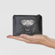 Zip pouch card holder "OWL-ROBOT" in grained calf, black color and shiny gun metals - in hand