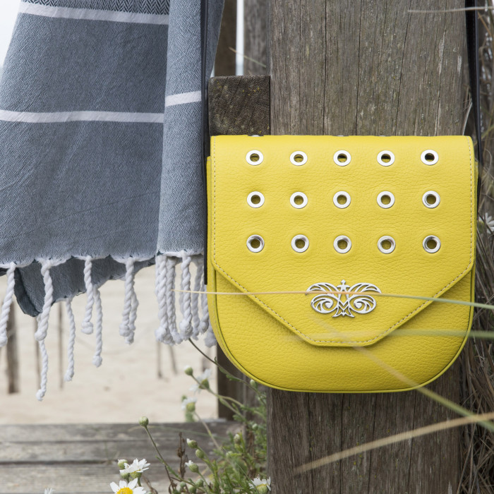 Small crossbody bag "DINA ROCK" in grained leather, lemon yellow colour - ambiance