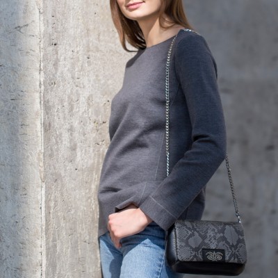 AVA Baby, small handbag in calf and python, grey color - on model in Paris